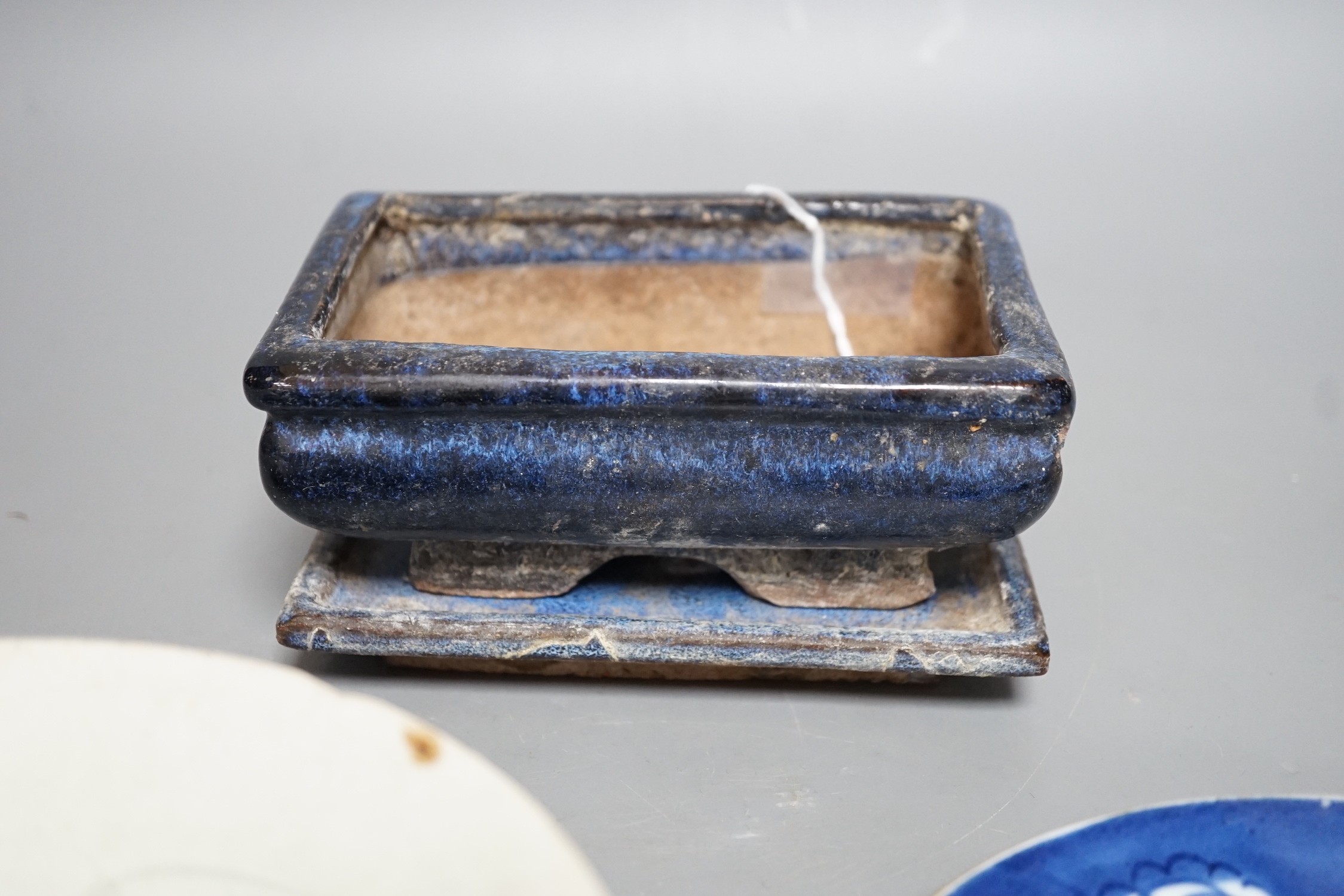 A Chinese blue and white plate a pottery planter and stand and a Qingbai type bowl, bowl 16.5cms diameter